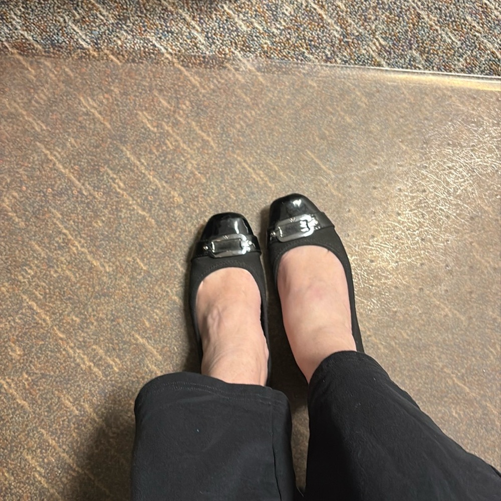 Well worn ballet flats